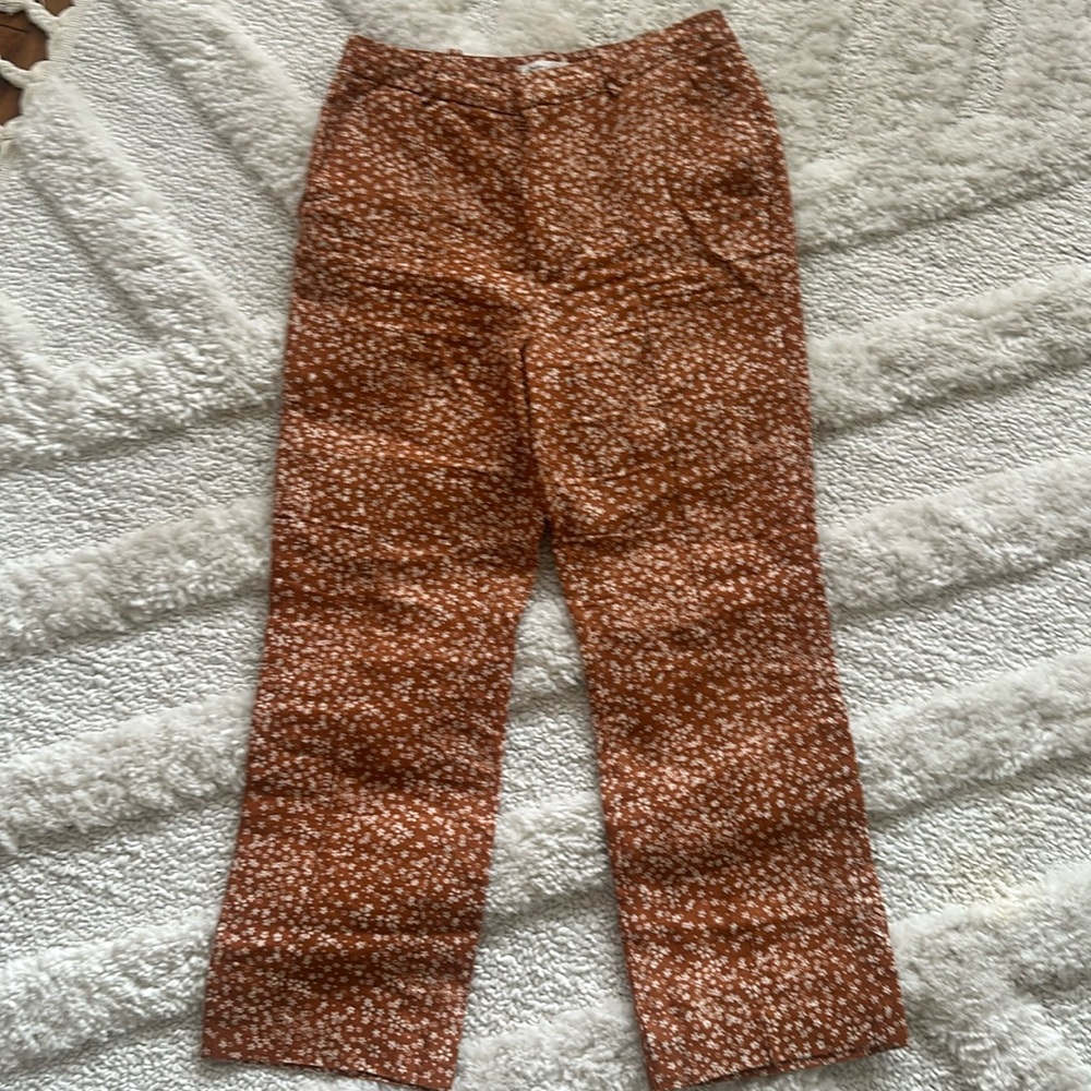 Free People floral ankle length pants 
100% linen 
Size 8